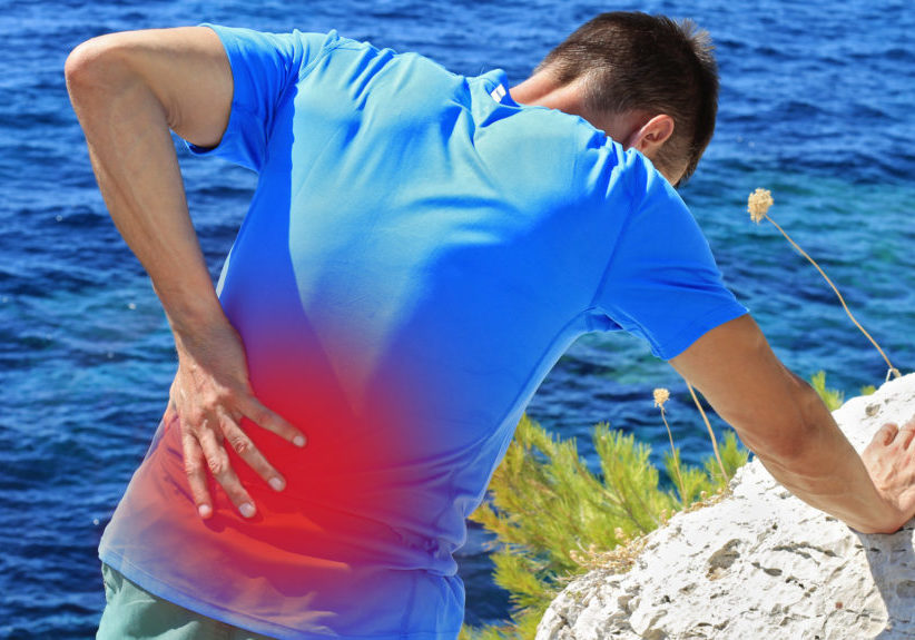 Man with back pain. Sport injury